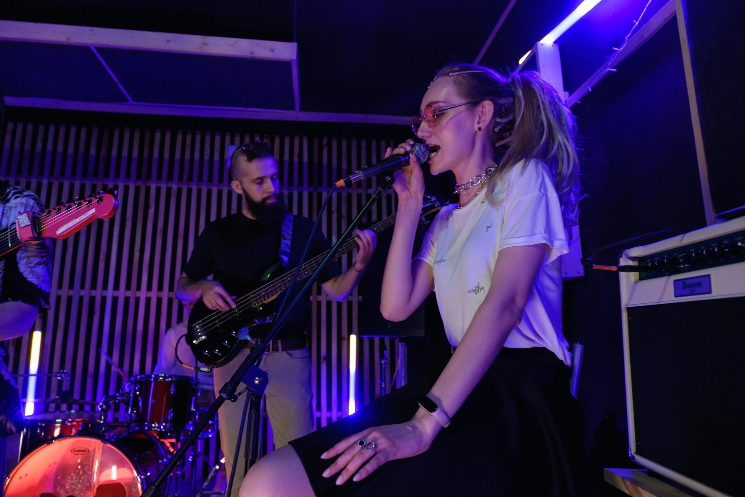 Singer in a rock band performing.